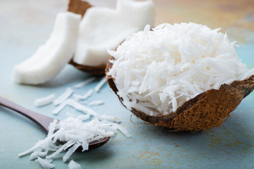 Shredded coconut in a coconut shell